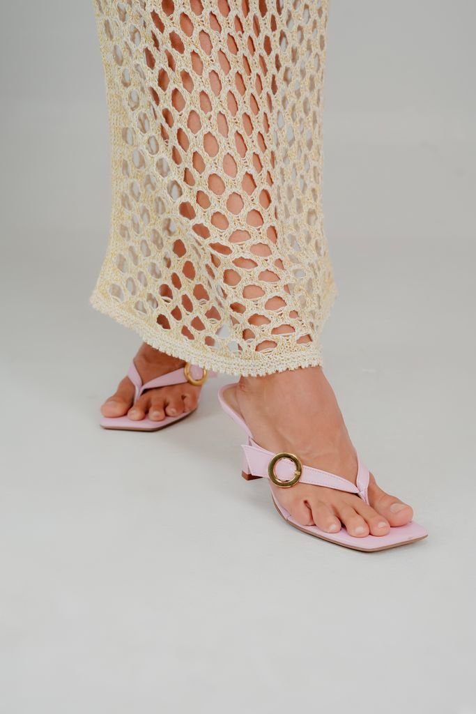 Pastel crochet midi dress styled with sandals for a resort lunch